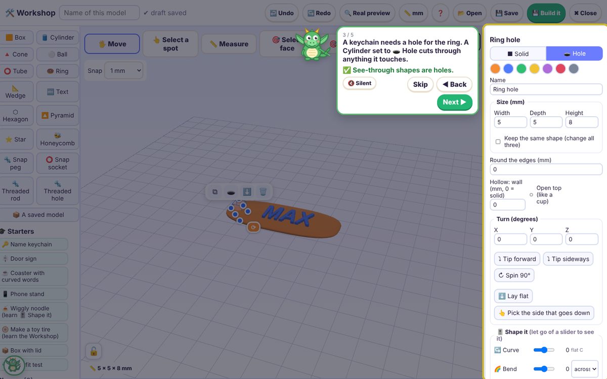 The KidCAD Workshop: Sparky explains holes while a name keychain that says MAX is built